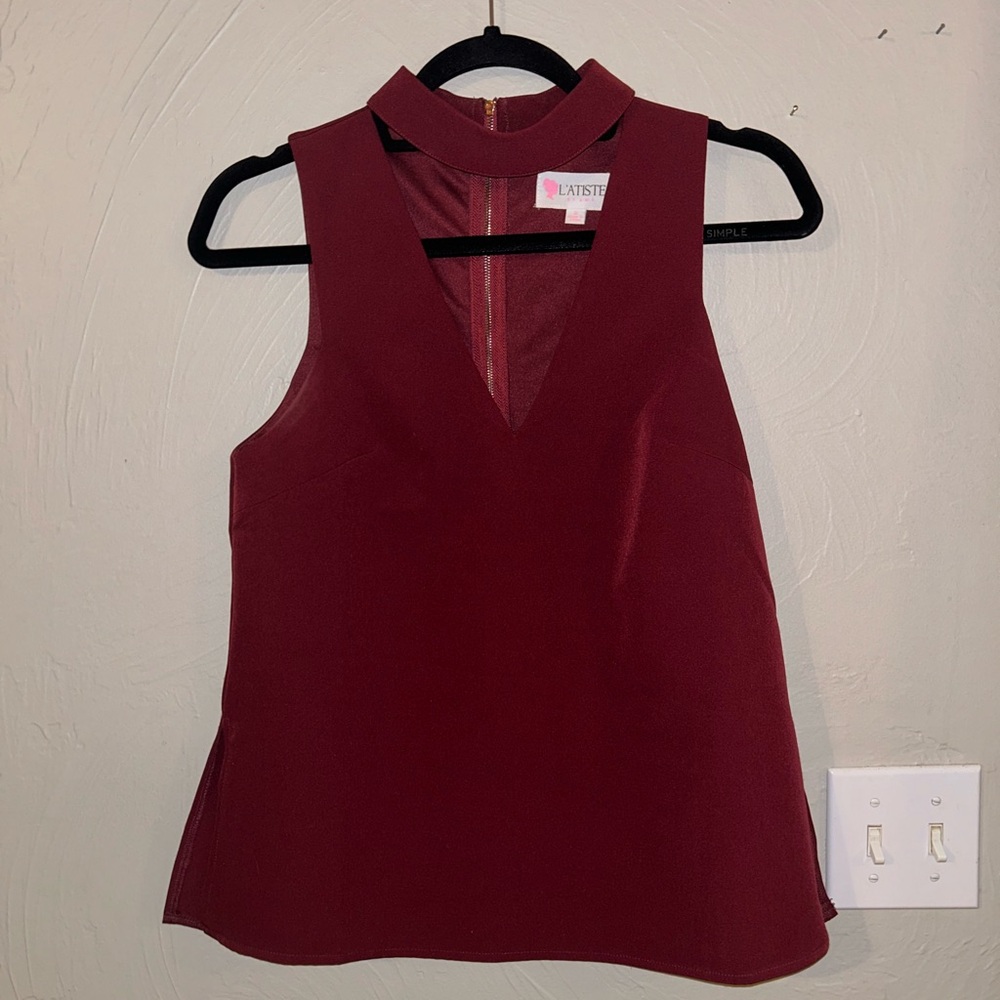 Maroon or wine red tank top with side slits and cheesy cutout